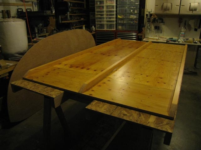 The floor is finished, pattern has taken shape - used a belt sander for smooth curves