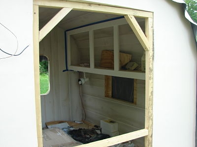 Front inside cabinets.