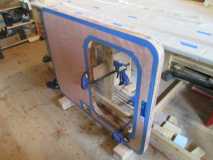 Curb Door Clamped To Bench