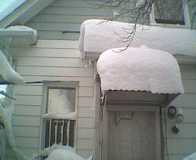 Snow on rear of house