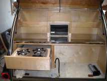 finished galley with two burner stove and stainless counter options